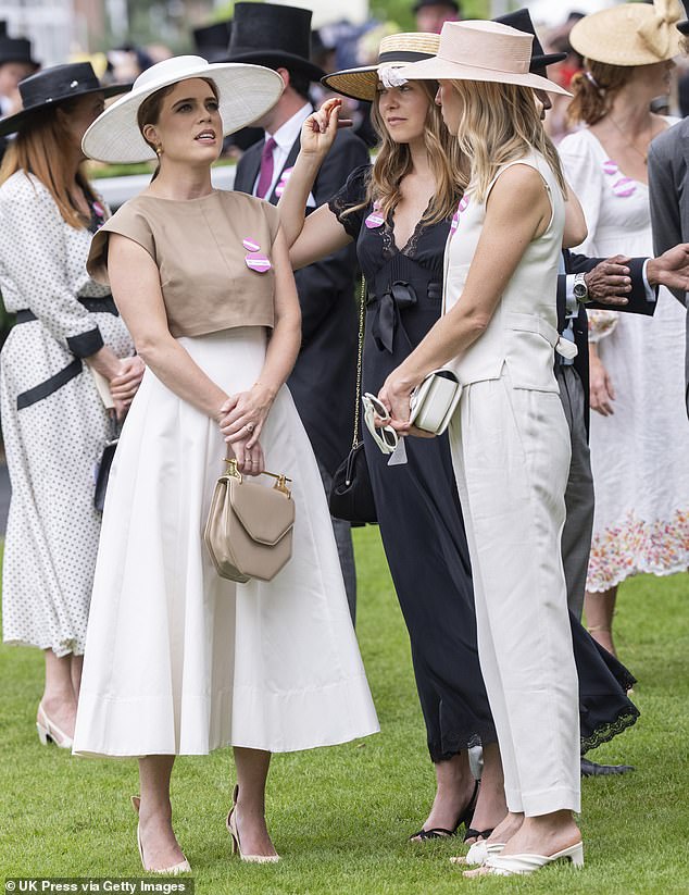 Putting on a chic display, Eugenie stunned in a stylish wide-brimmed hat and flattering dress