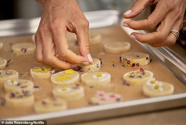Flower sprinkles are flower petals that Meghan uses as decorations on her cookies