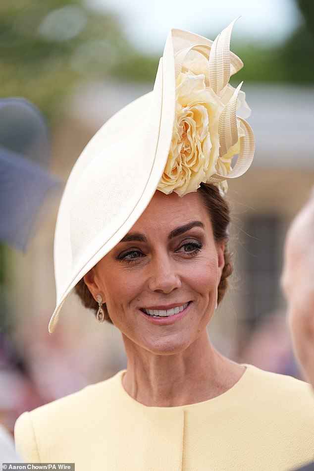 At the Buckingham Palace garden party yesterday, Kate Middleton (pictured) rewore a floral-inspired Philip Treacy hat dating back to Prince Harry and Meghan Markle's wedding in 2018
