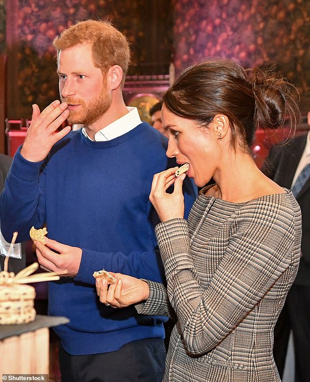 Harry and Meghan taste traditional Welsh cakes during a visit to Cardiff Castle in January 2018