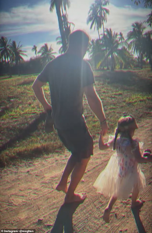 The Duchess of Sussex has shared her most intimate glimpse of her family life in Montecito yet, including footage of Prince Harry with his youngest child (pictured)