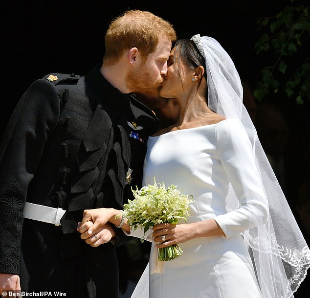 Prince Harry and Meghan kiss outside St George's Chapel on their wedding day. It was the celebrity event of the year when the couple said 'I do' in May 2018