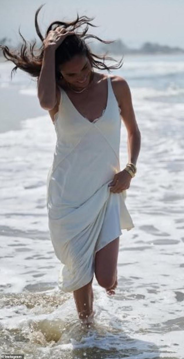 Meghan Markle has continued her social media blitz, boasting of her excitement of 'all the good to come' while strutting on a sunny beach