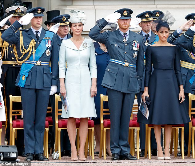 The brothers and their partners are pictured in July 2018 attending a ceremony to mark the centenary of the Royal Air Force on the forecourt of Buckingham Palace